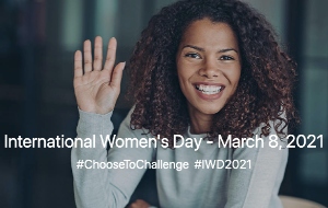A woman smiles and waves her hand. Text in the image says International Women's Day March 8 2021. #ChooseToChallenge #IWD2021