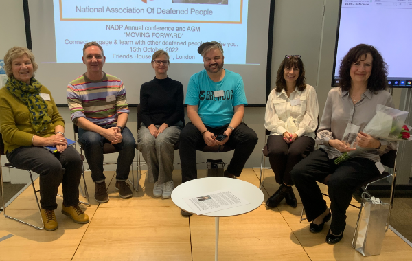 Jane with a panel of speakers