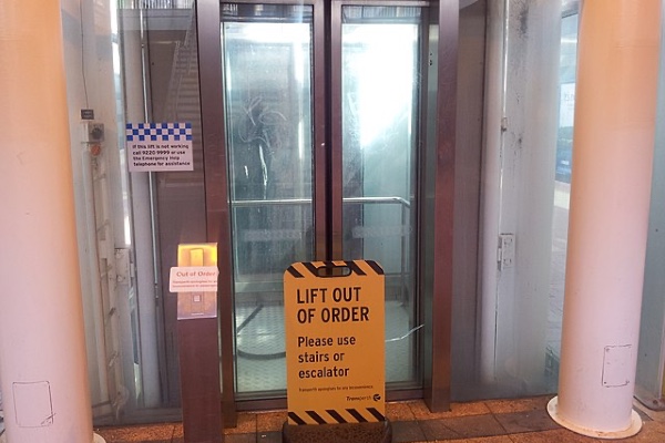 Broken lift with Out Of Order sign