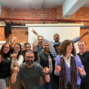 A diverse group of people celebrating
